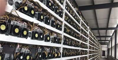 Large-scale mining farm featuring multiple hosted mining machines in operation