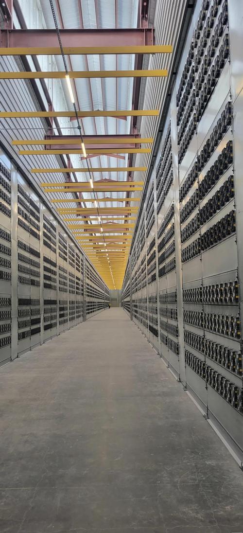 ASIC mining rigs lined up in Canadian mining farm producing efficient Bitcoin mining results