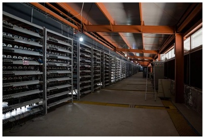 A close-up of a modern Bitcoin mining rig, showcasing its powerful processors and cooling system